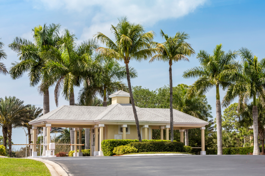 A residential estate entrance with a boom gate controlling vehicle access for Proactive Specialised Security Solutions.