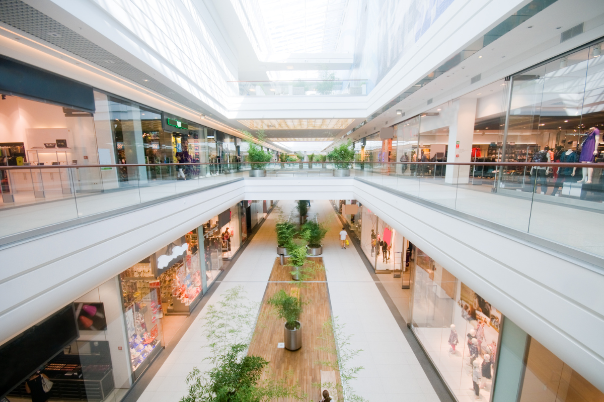 Interior view of a shopping mall representing retail security and customer safety.